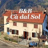 Ca’ dal Sol Palanzano con struttura rurale e panorama naturale dell’Appennino parmense.