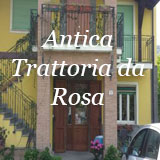 Antica Trattoria Da Rosa Terenzo con piatti tipici parmensi e atmosfera rustica di trattoria tradizionale.